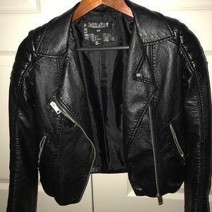 leather jacket with silver zipper embellishments